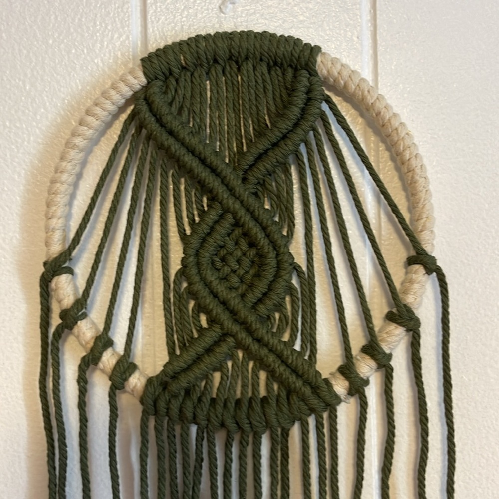 Handmade macrame wall hanging, dreamcatcher style.